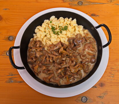 Chanterelle sauce with spaetzle in a restaurant in Austria,Europe
