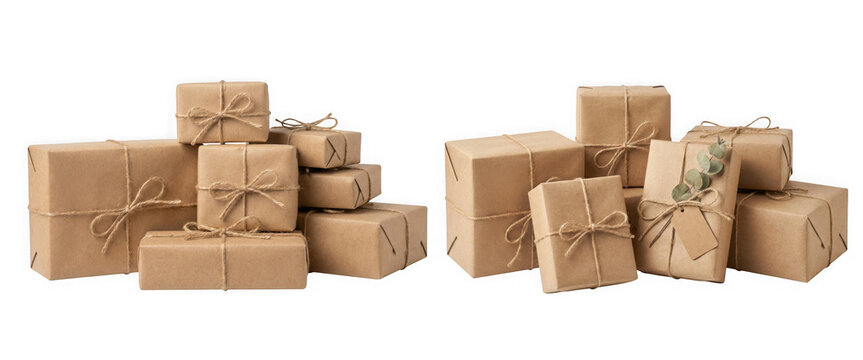 Two piles of rustic brown paper gift boxes tied with twine isolated on transparent background