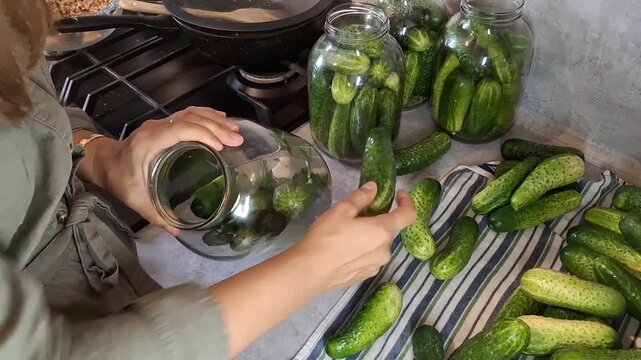 Cucumber pickling process in the kitchen during summer