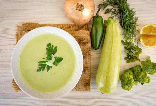 Vegetable soup with ingredients carrot cauliflower potato parsley pepper