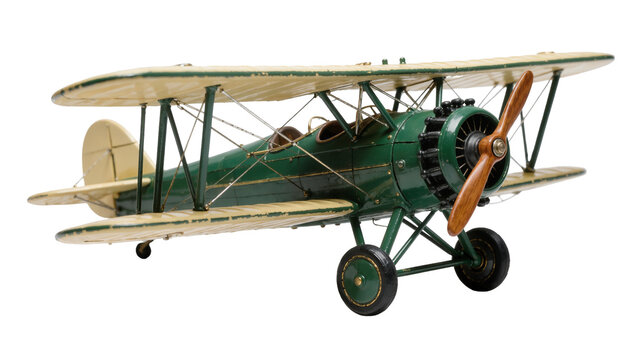 Green and cream biplane model with wooden propeller, isolated on transparent background