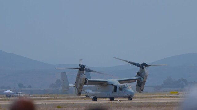 Osprey aircraft hovering on the runway