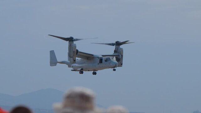Osprey military craft displaying its vertical skills