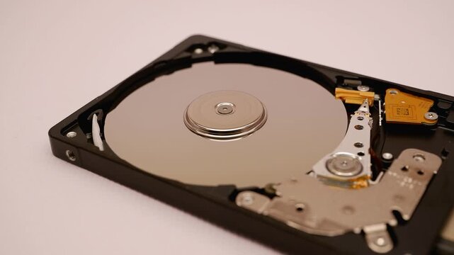 Open Hard Drive Spinning Platter Close-Up 4K Macro B-Roll