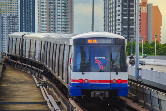 Bangkok, Thailand - June  16, 2026 : The BTS Sky Train Passing Taksin Bridge (Saphan Taksin or Saphan Sathorn) in the afternoon.