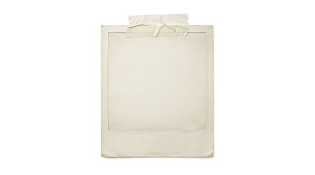 Vintage polaroid frame taped to a white background with copy space