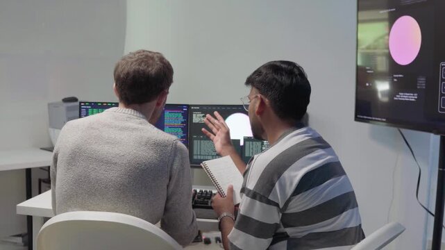 Team engineers software development are brainstorming using computer writing code. Programmer teamwork meetings using technology artificial intelligence work system about cyber security and coding