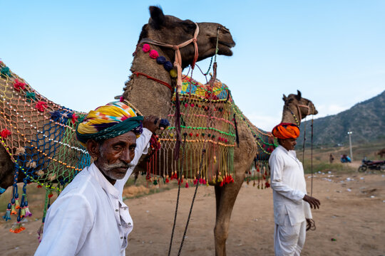 Two camel herder during Pushkar Mela Camel Fair Festival