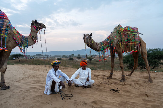 Two camel herder during Pushkar Mela Camel Fair Festival