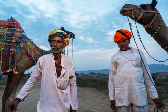Two camel herder during Pushkar Mela Camel Fair Festival