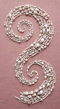 S-shaped decorative swirl made of tiny white skulls on a muted pink textured background.