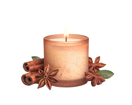 Fragrant, glowing candle with spices nearby
