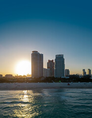 Fototapeta premium Miami shoreline. Miami seaside with turquoise ocean and sky. Famous oceanfront of Miami. Miami city.