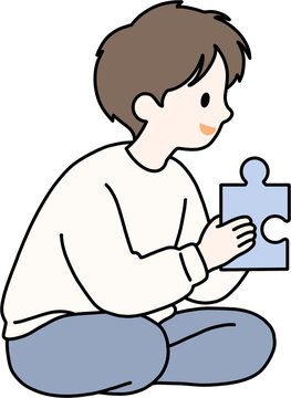 Young man holding a puzzle piece, solution and strategy concept