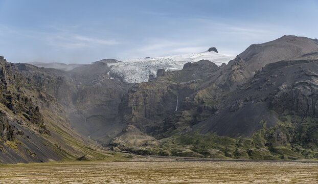 Mountain landscape with gorge, M&yacute;rdalsj&ouml;kulls glacier in the back, Sudurland, Iceland