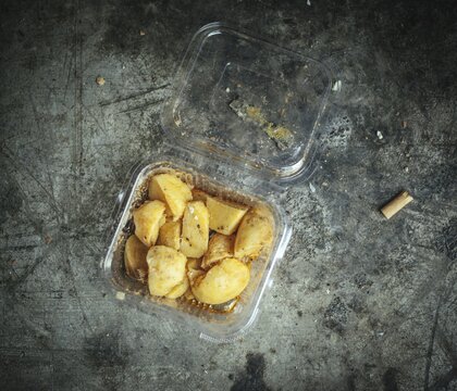 Potatoes with spices, food from food distribution for refugees in camp Idomeni, Greece