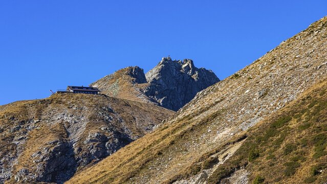 The mountain peaks Gro&szlig;er and Kleiner Ifinger, in front of the Kuhleiten Hut, Merano 2000 skiing and hiking area, near Merano, South Tyrol, Italy