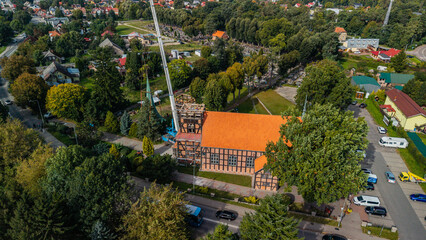 Zdejmowanie dachu wieży Kościoła w Stegnie © Marcin