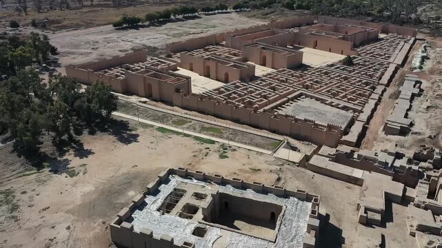 Slow aerial pan over the ruins of ancient Babylon, Iraq