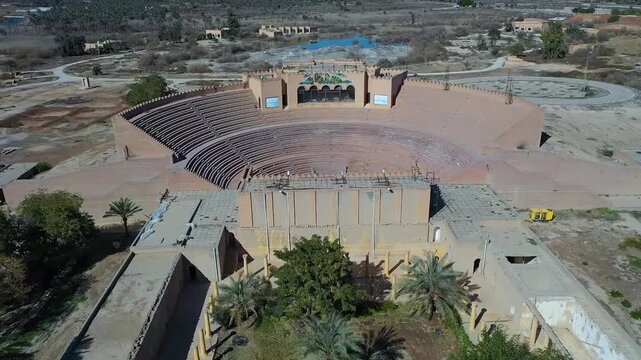 Slow aerial pan over the ancient Greek theater of Babylon, Iraq