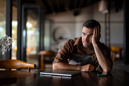 Lonely entrepreneur facing business failure and mental exhaustion