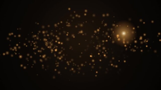 Golden bokeh particles swirling around glowing lens flare on black backdrop in looping clip.