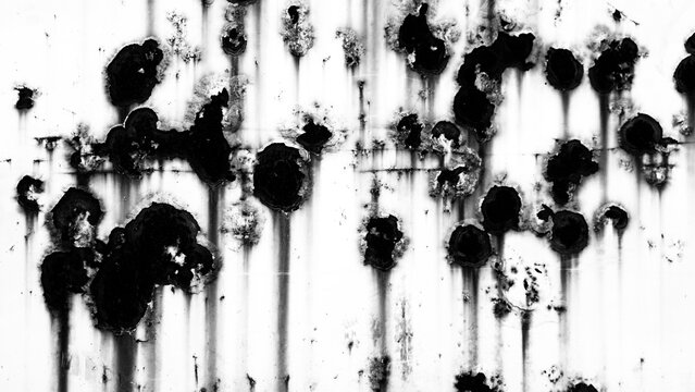 Black and white high contrast rusted metal surface texture with heavy corrosion and drip spots close up