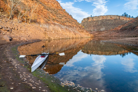 coastal sculling shell in sandstone canyon of Horsetooth Reservoir in Colorado in fall scenery