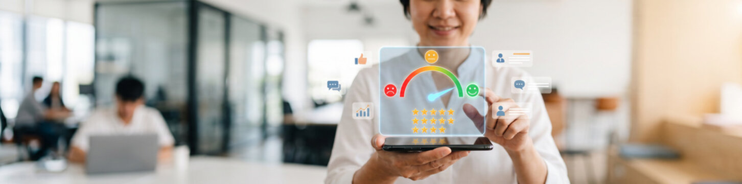 Person using a smartphone while viewing a customer satisfaction dashboard with colorful rating gauge, emotion icons and star feedback symbols, customer experience, online reviews, service quality, cli