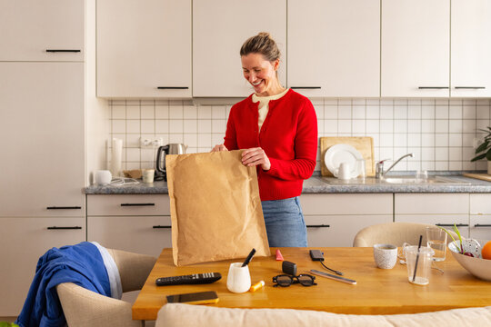 Woman opening package