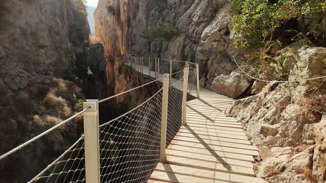 El Caminito del Rey, a walking trail running along the steep limestone gorge walls in the Desfiladero de los Gaitanes National Park, near the village of El Chorro in the Spanish province of Malaga