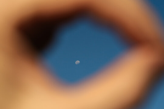 Moon Framed By Hands