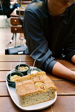 Focaccia with Dips Served at a Restaurant Table