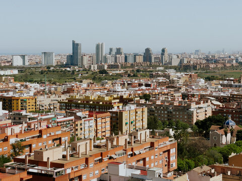 Valencia cityscape with residential rooftops and modern skyline