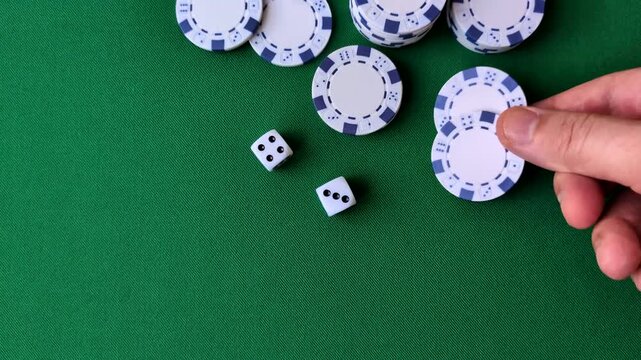 Multicolored casino chips as a conceptual backdrop for gambling games like poker, blackjack