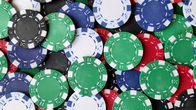 Multi colored gaming chips for betting in casino games. Betting chips