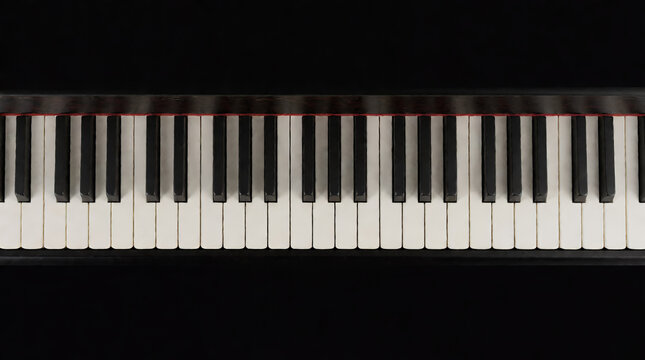 Piano keys on a black background in a minimalist style