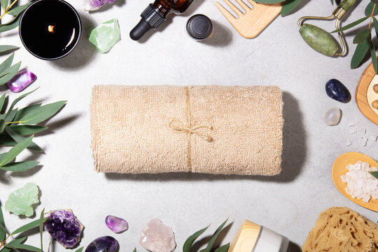 Spa Composition with Rolled Towels and Natural Wellness Accessories