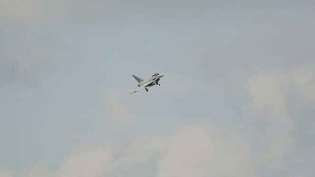 Military Eurofighter Typhoon jet flying slow and low