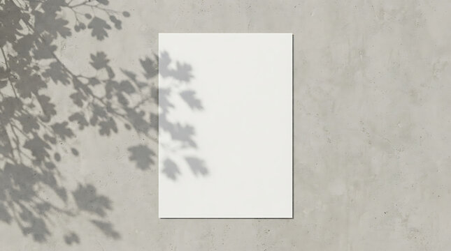 Vertical white paper poster mockup with leaf shadow on concrete
