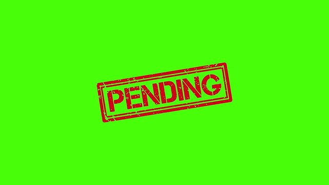 Red pending rubber stamp impression on green screen background, grunge texture effect for business approval and status updates