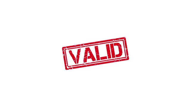 Red valid rubber stamp impression on white background, grunge texture approval concept approved