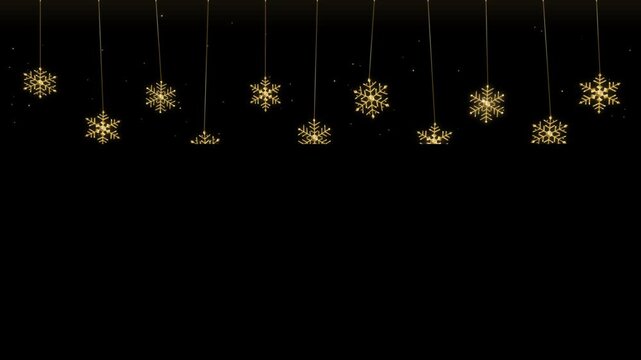 Hanging gold glitter snowflakes garland suspended on black background, sparkling holiday star glints along top border with negative copyspace for Christmas greeting card loop in 4K UHD