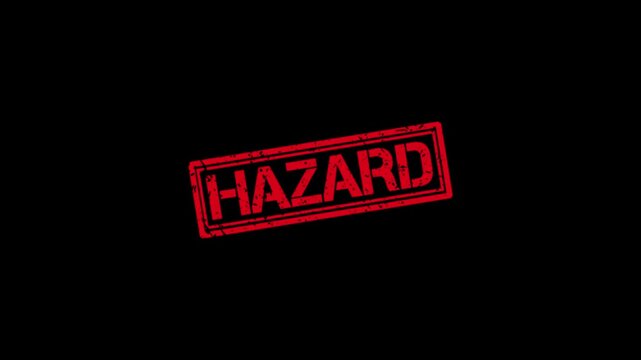 Hazard warning stamp animation: red grunge text effect on black background, for industrial safety, and risk alerts