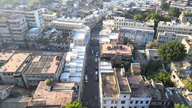 Aerial View of Dense City Street with Colonial Buildings and Rooftops