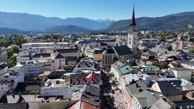 Cinematic Drone Footage of Villach Austria &ndash; Historic Old Town, Church and Alpine Mountains