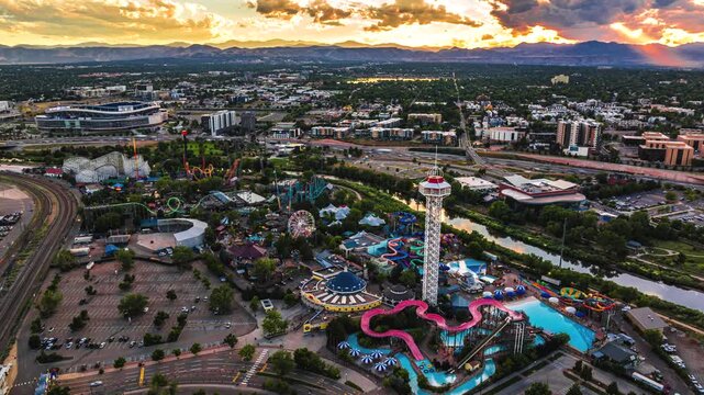 Aerial view of Elitch Gardens Theme and Water Park with roller coasters, water slides, and the observation tower in Denver, Colorado, United States.