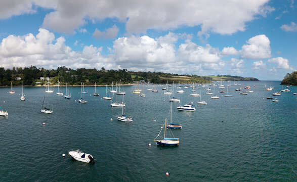 Aerial panorama of Helford Passage and river in Cornwall, UK with marina and sailing boats