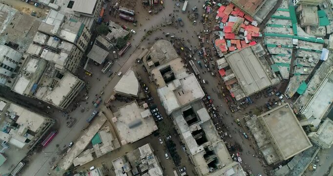 Aerial view of dense urban landscape with crowded streets, residential buildings, and heavy traffic in Karachi, Sindh, Pakistan.