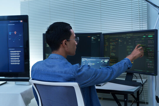 Programmer Developing Software with Artificial Intelligence Code